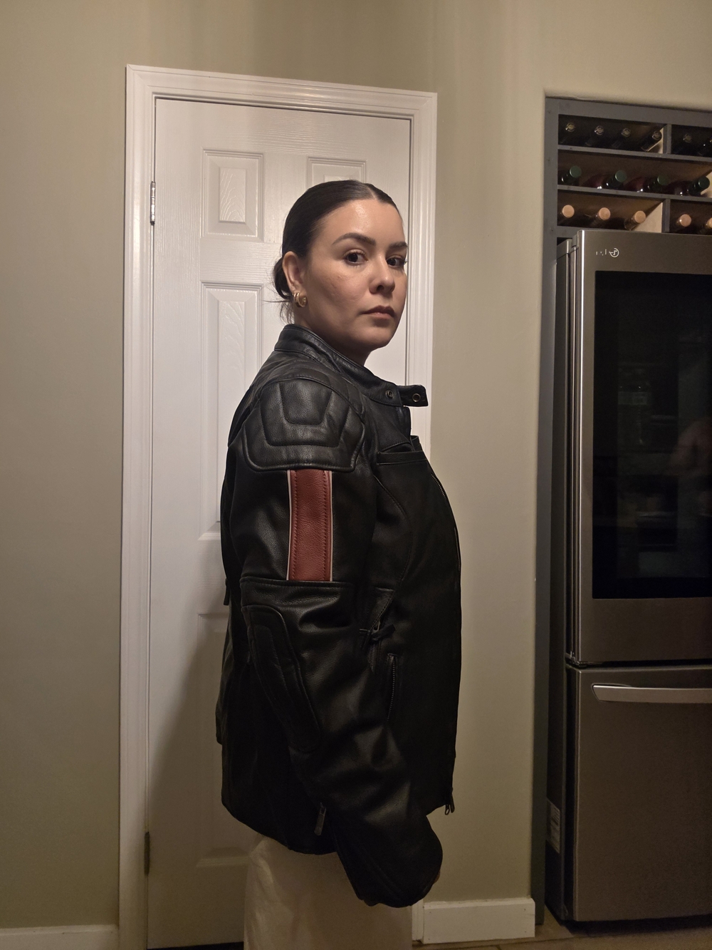 Classic Black Leather Jacket with Red Accent Sleeve - Women's